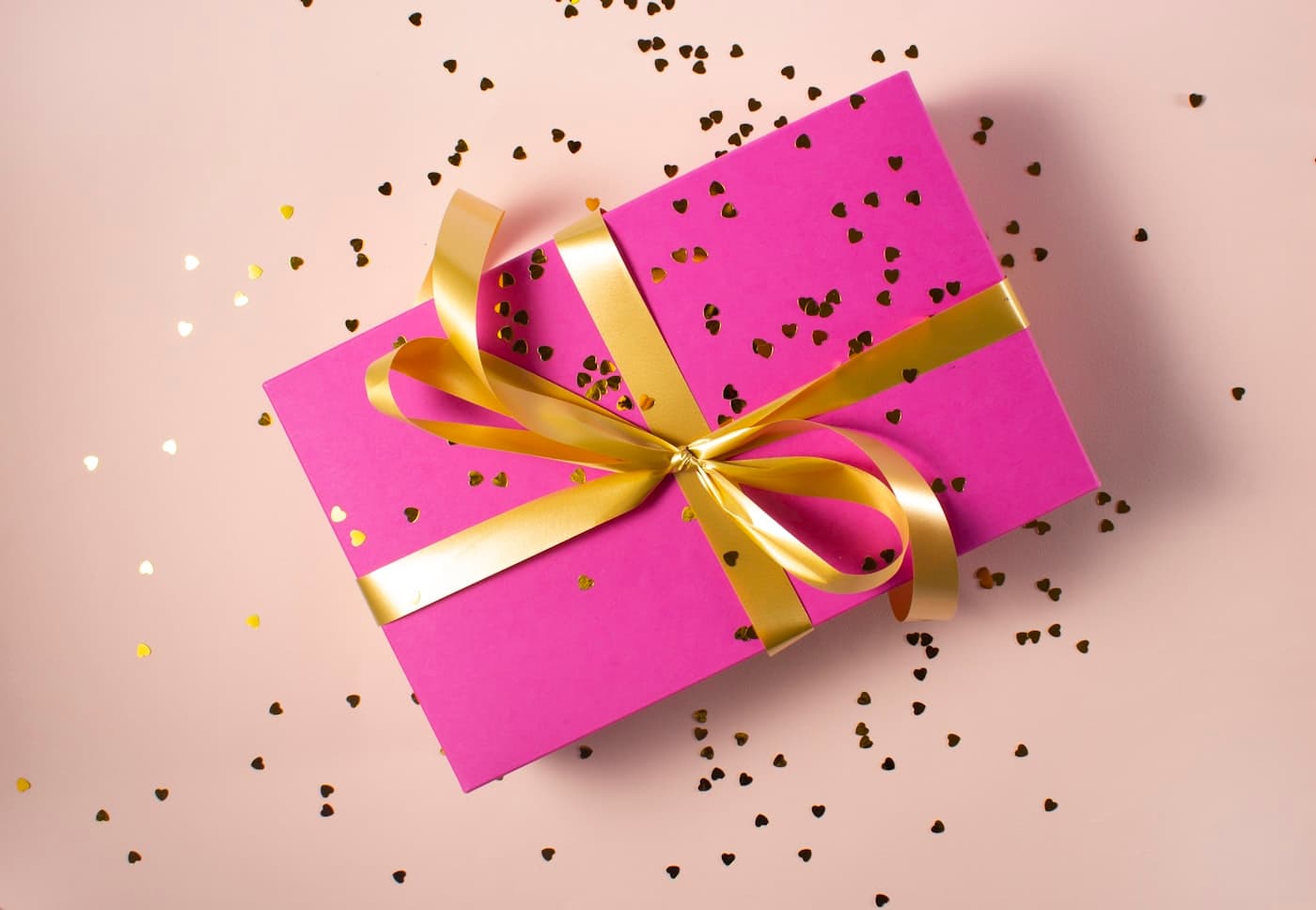 Wrapped gift box with a ribbon on a table
