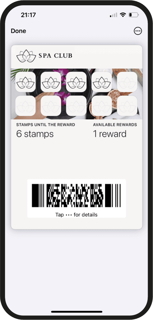 Branded digital stamp card displayed in Apple Wallet: ten lotus-shaped stamp slots with four filled, 6 stamps until the reward, 1 available reward and a scan code